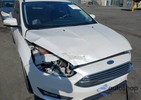 2016 Ford Focus Titanium z USA, uszkodzony, nr VIN 1FADP3J24GL236096